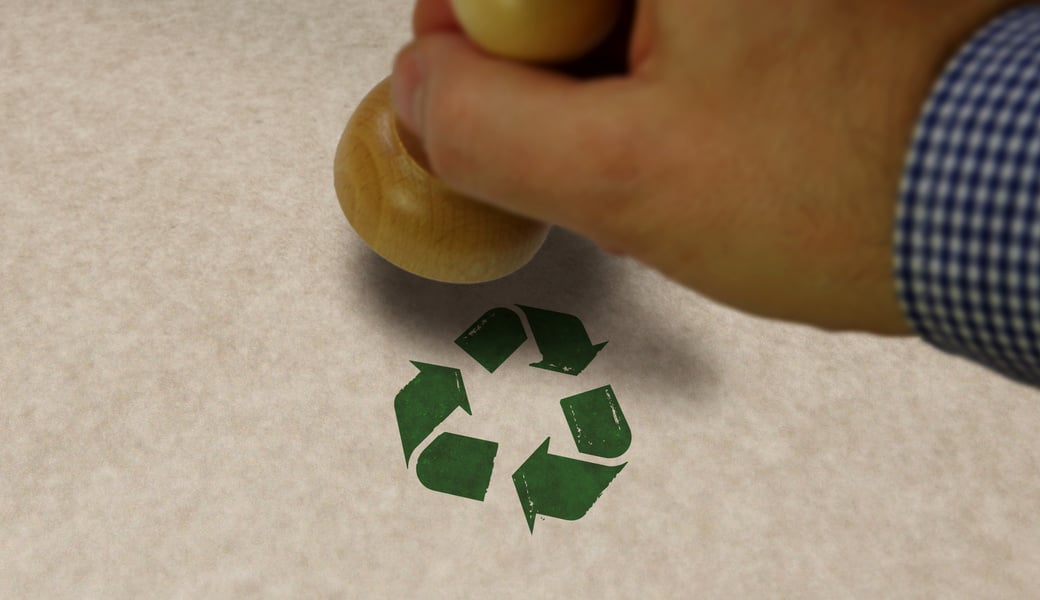 Recycling symbol stamp and stamping